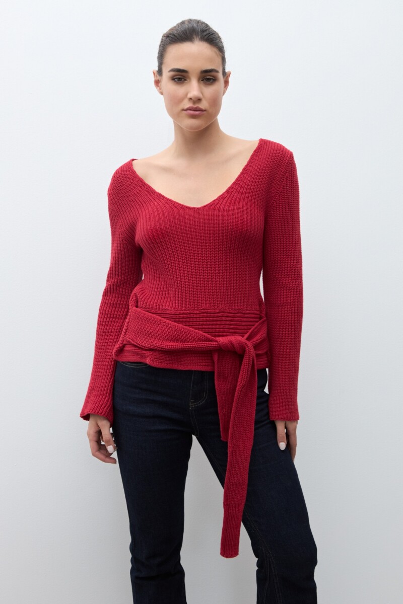Sweater con lazo rojo