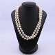 Collar de perlas 2 hilos con broche oro 18k blanco con esmeralda central y brillantes. Collar de perlas 2 hilos con broche oro 18k blanco con esmeralda central y brillantes.