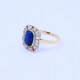 Anillo oro 18k antiguo con piedra de color y brillantes. Anillo oro 18k antiguo con piedra de color y brillantes.