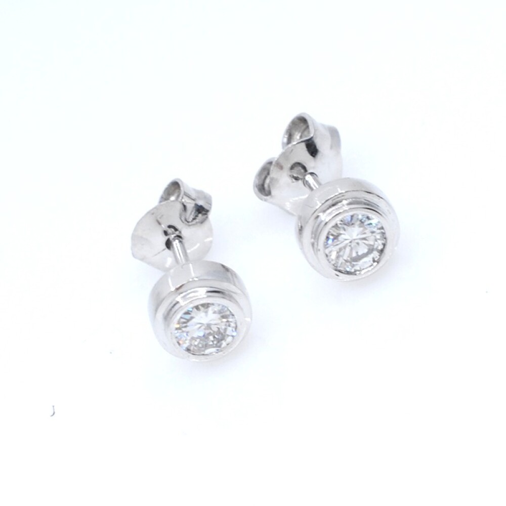 Caravanas en oro blanco 18k y brillantes Caravanas en oro blanco 18k y brillantes