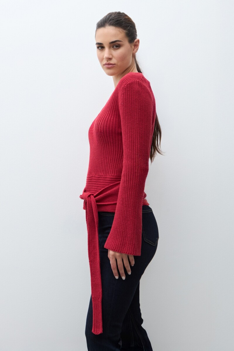 Sweater con lazo rojo