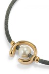 PULSERA DE HILO NEGROSO CON PERLA SHELL FORNITURA BAÑADA EN ORO 18K. Pulsera