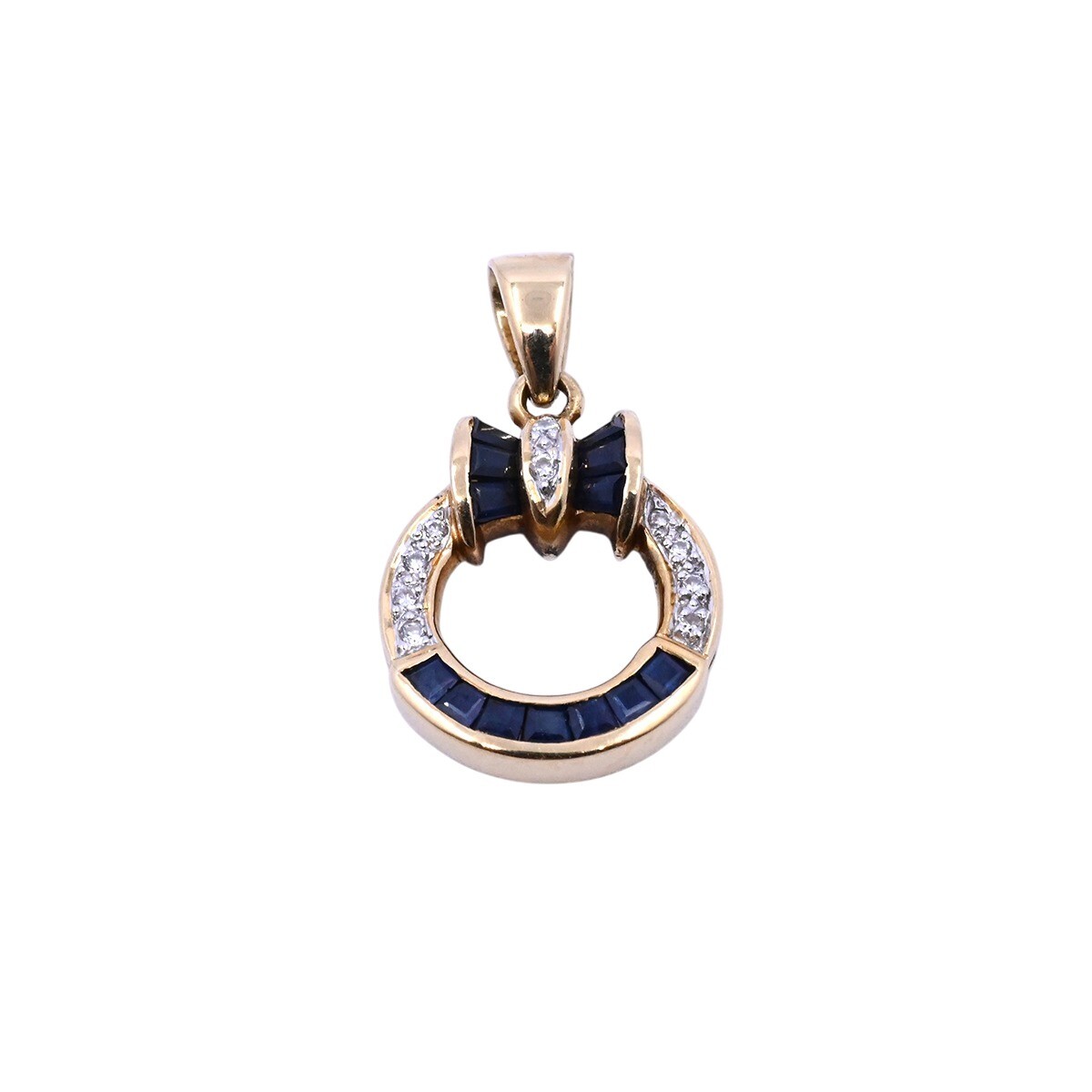 Dije oro 18k con zafiros y brillantes. 