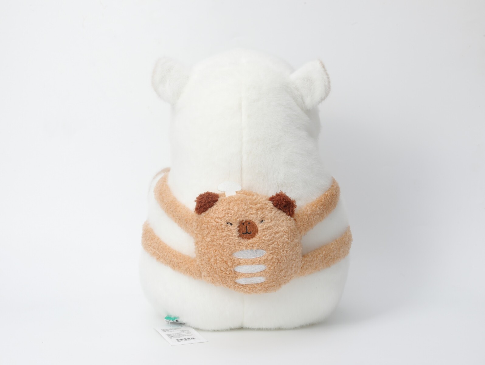 CARPINCHO BLANCO CON MOCHILA MARRÓN DE 35 CM 