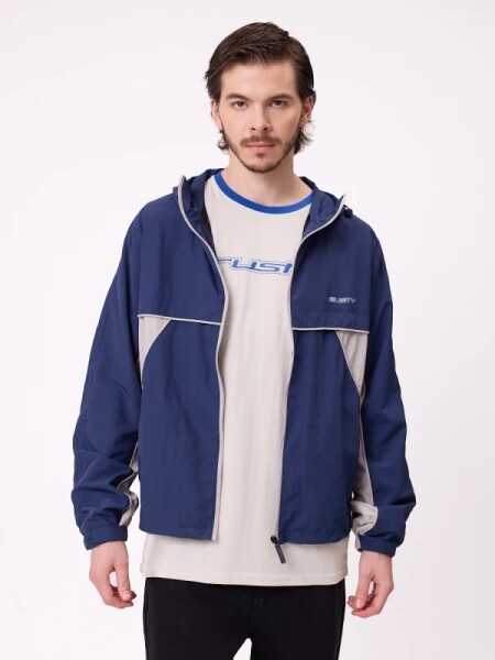 CAMPERA RUSTY COWARIE ROMPEVIENTOS AZUL