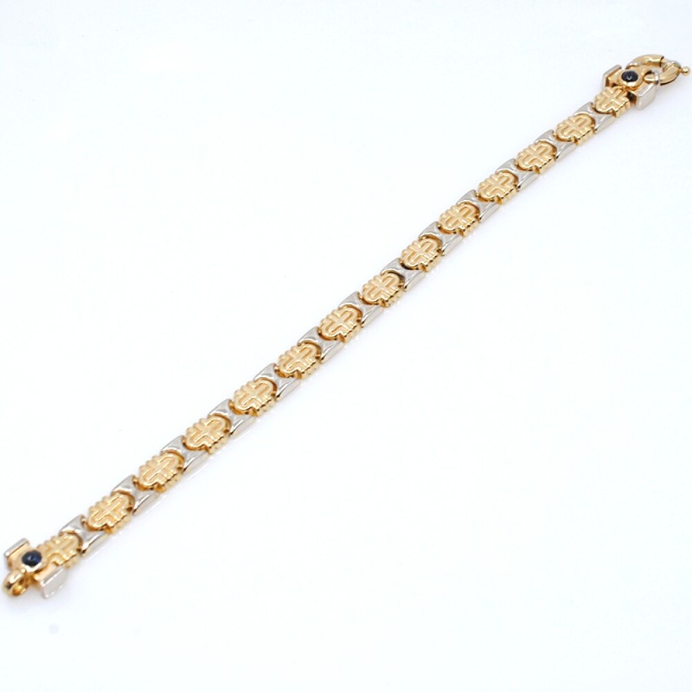 Pulsera en oro 18k combinada en 2 tonos con zafiros cabujón Pulsera en oro 18k combinada en 2 tonos con zafiros cabujón