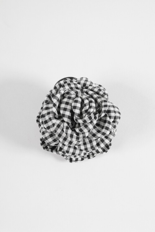 Broche flor tela cuadrillé negro