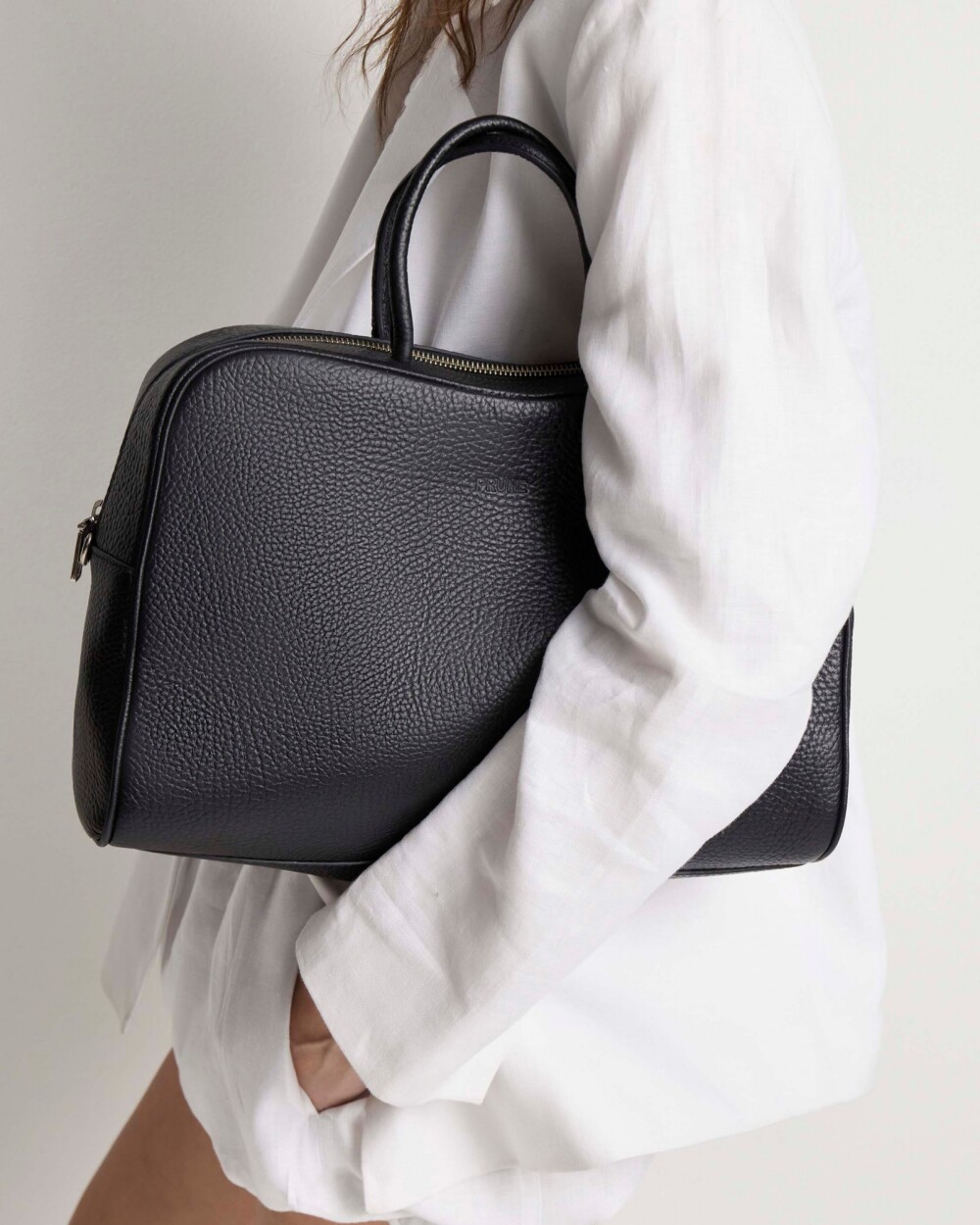 Cartera de mano The Club en cuero graneado Negro