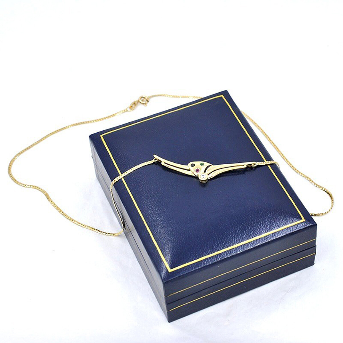 Cadena En Oro 18K Con Dije En Rubi, Zafiro, Esmeralda Y Zirconia 