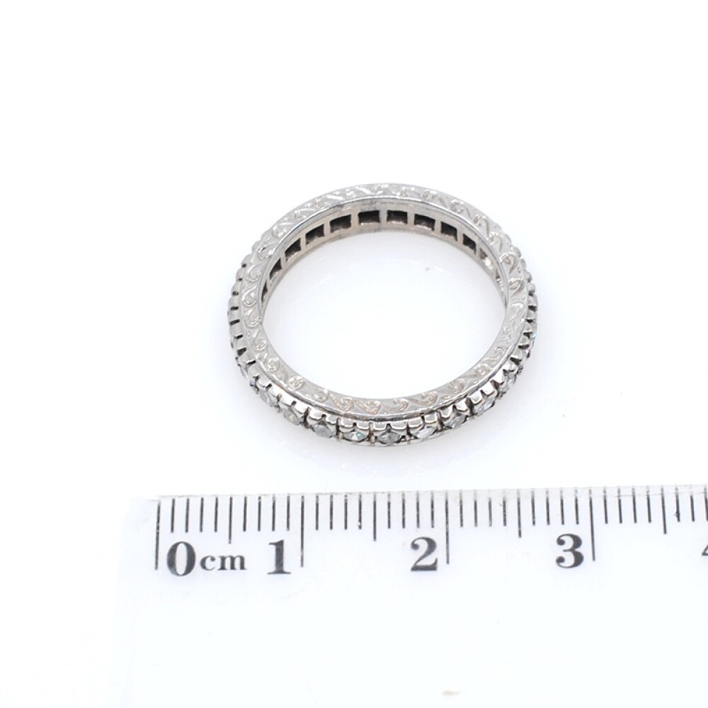 Anillo sin fin en oro 18k blanco y brillantes Anillo sin fin en oro 18k blanco y brillantes