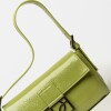 Cartera al hombro Signature en cuero charol Moss
