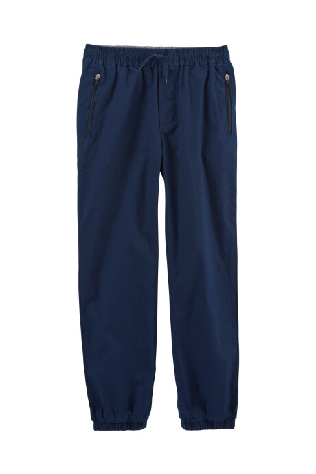 Pantalón de lona elastizada bolsillos con cierre. Talles 6-14 Sin color