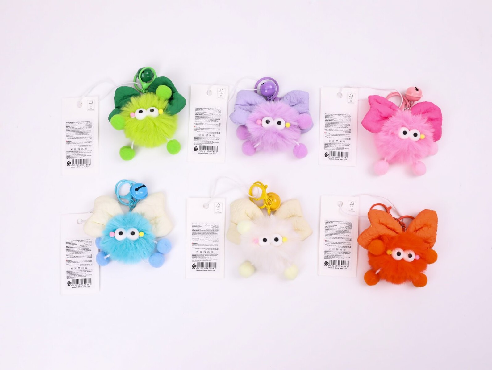 COLGANTE PARA BOLSO DE DUENDE DE HOLLÍN CON PAJARITA 