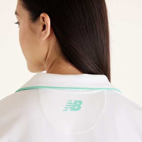 Remera New Balance de Dama - Tournament Polo - WT61S8TLWT WHITE