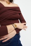 PULSERA DE CUERO DOBLE NEGRO CON MOSQUETÓN ENTRELAZADO BAÑADO EN ORO 18K Pulsera