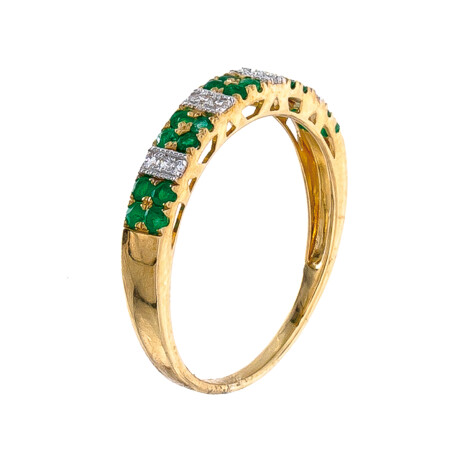 Anillo de oro 9 ktes con esmeralda y circonias. Anillo de oro 9 ktes con esmeralda y circonias.