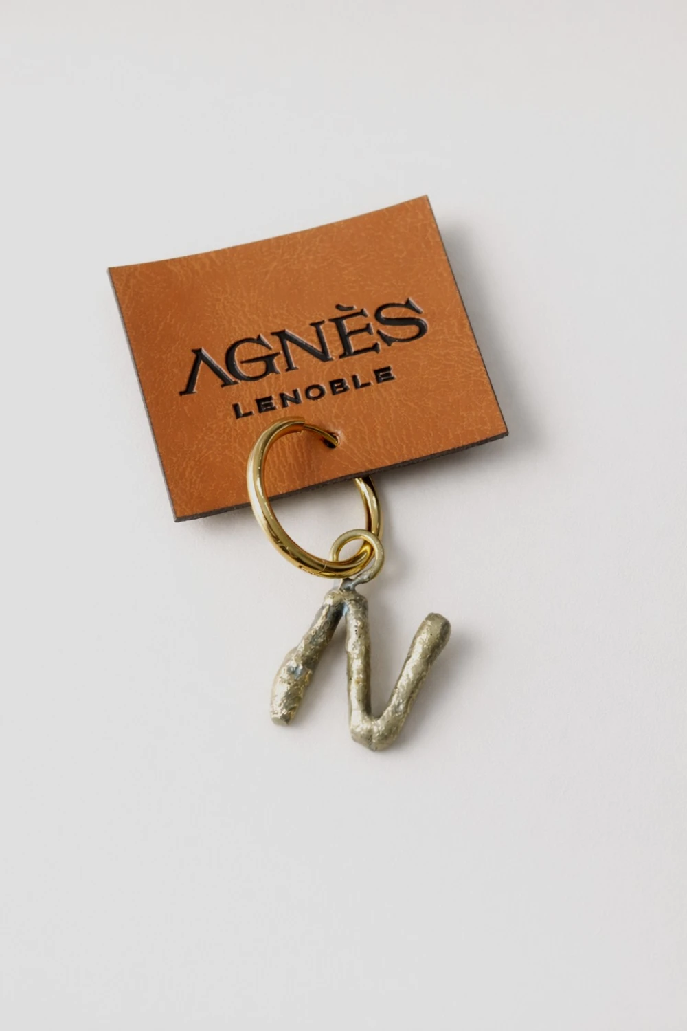 Spelling Earrings Bronce - N