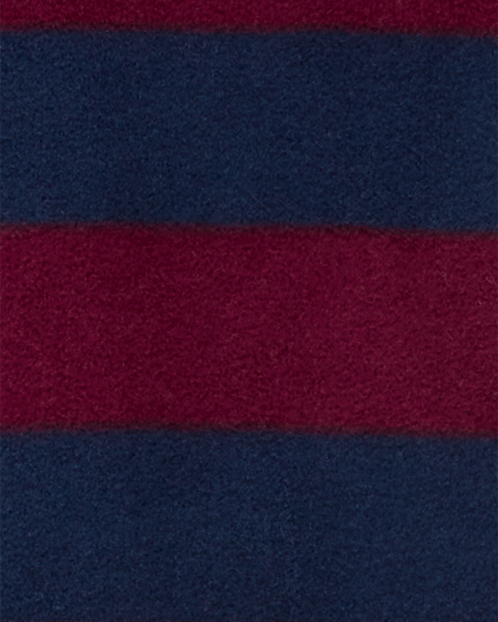 Pijama una pieza de micropolar, con pie, diseño a rayas. Talles 12-24M Pijama una pieza de micropolar, con pie, diseño a rayas. Talles 12-24M