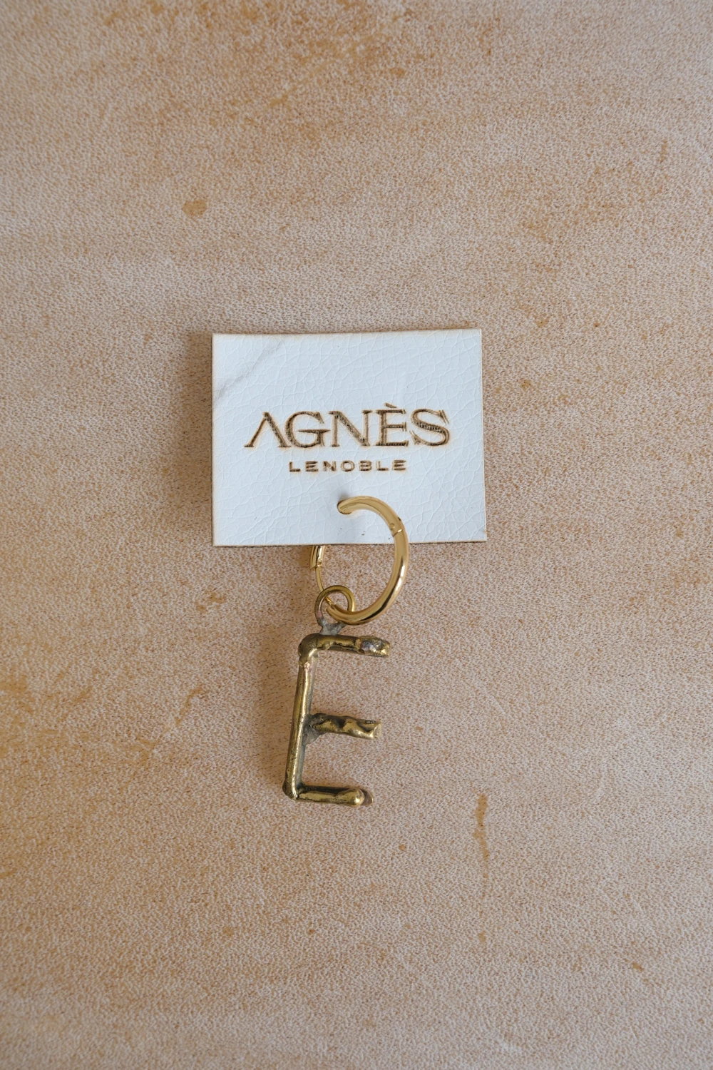 Spelling Earrings Bronce - E