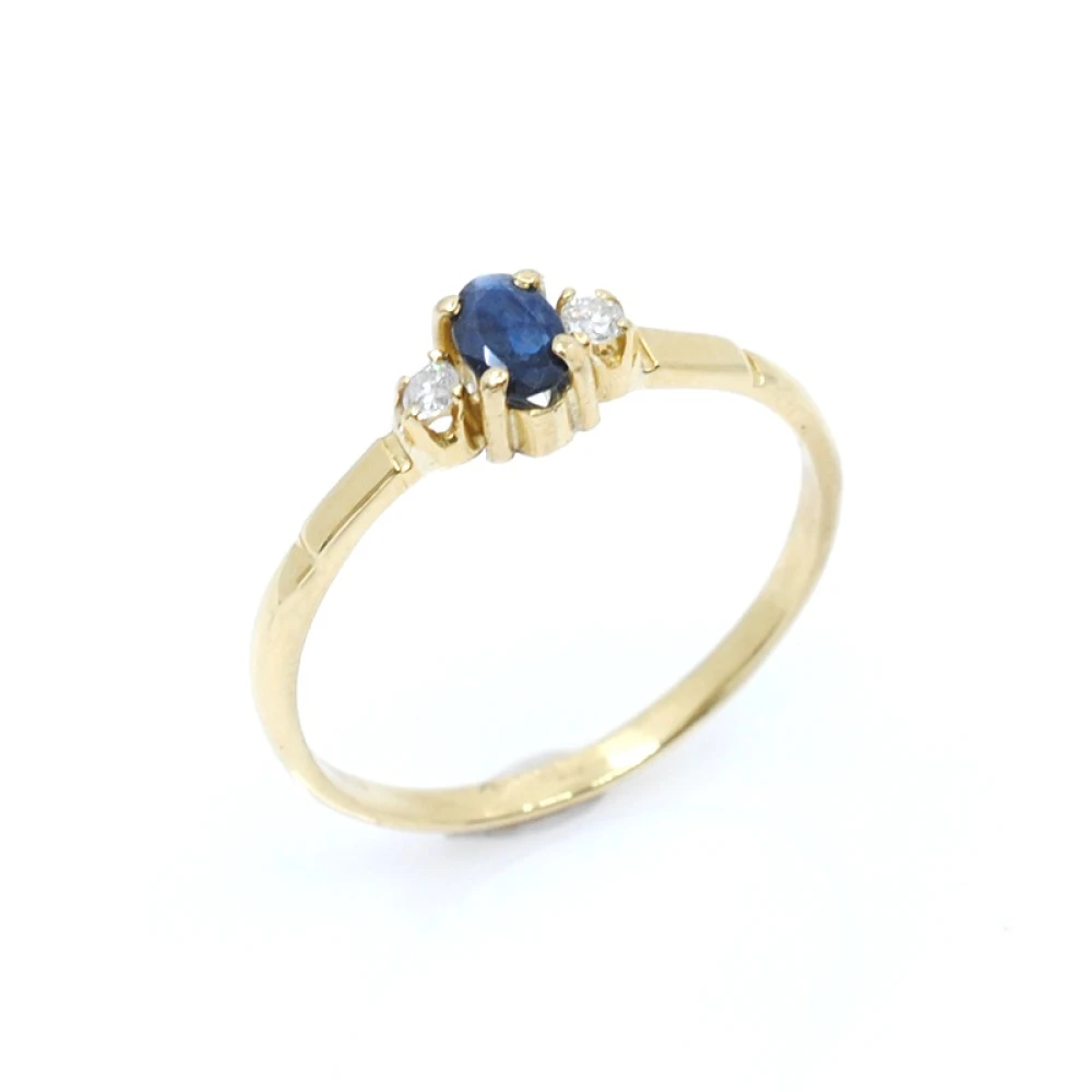 Anillo en oro 18k zafiro y brillantes Anillo en oro 18k zafiro y brillantes