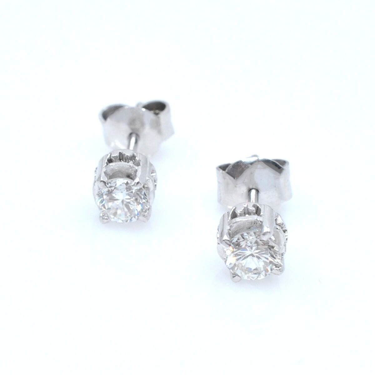 Caravanas en oro 18k blanco y brillantes 