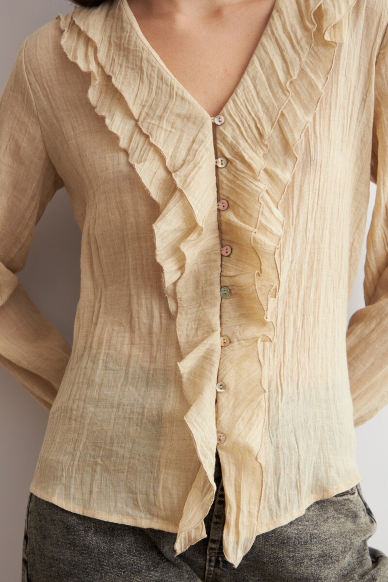 Blusa con volados beige