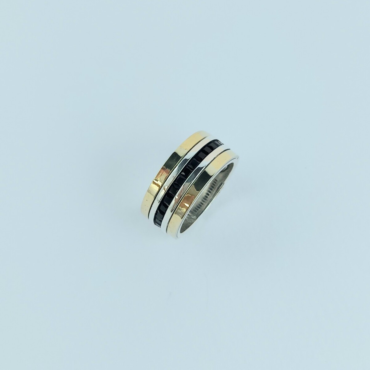 Anillo de plata 925 y double en oro 18 ktes con circonias. 