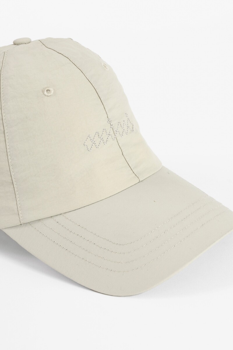 Cap waves beige