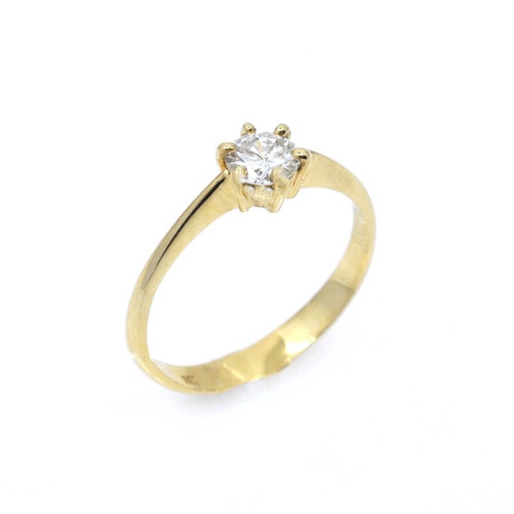Anillo solitario en oro 18k y brillante Anillo solitario en oro 18k y brillante
