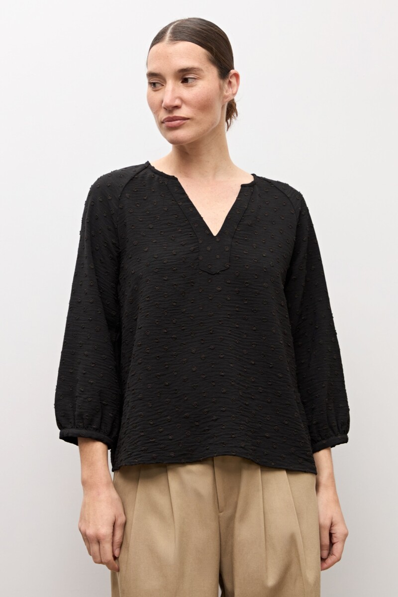 Blusa plumeti escote V negro