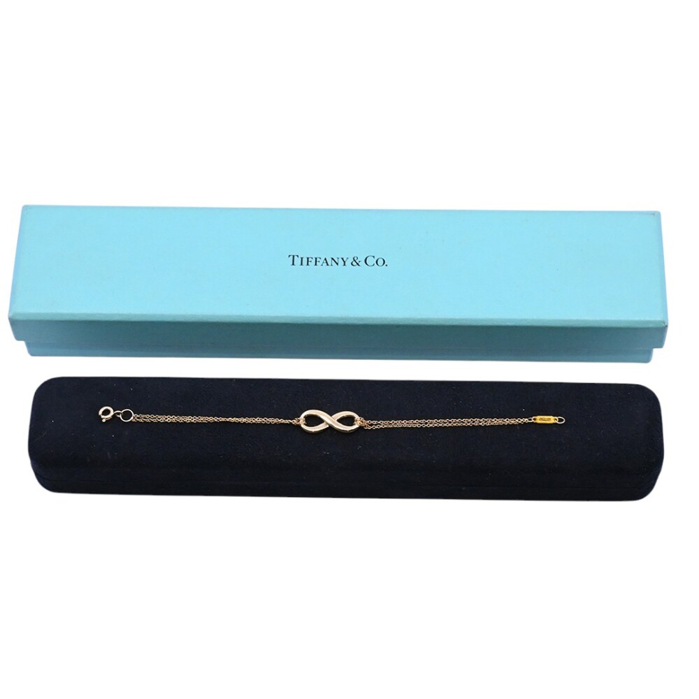 Tiffany & Co. Pulsera infinity oro 18 k amarillo con estuche. Tiffany & Co. Pulsera infinity oro 18 k amarillo con estuche.