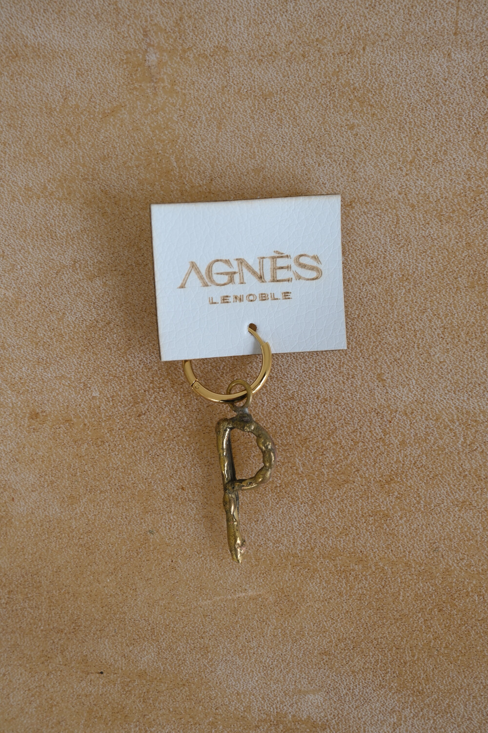 Spelling Earrings Bronce P