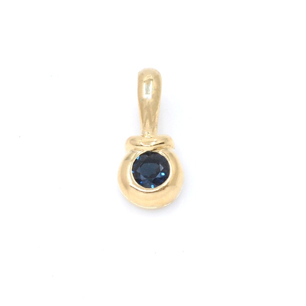 Colgante en oro 18k con zafiro azul Colgante en oro 18k con zafiro azul