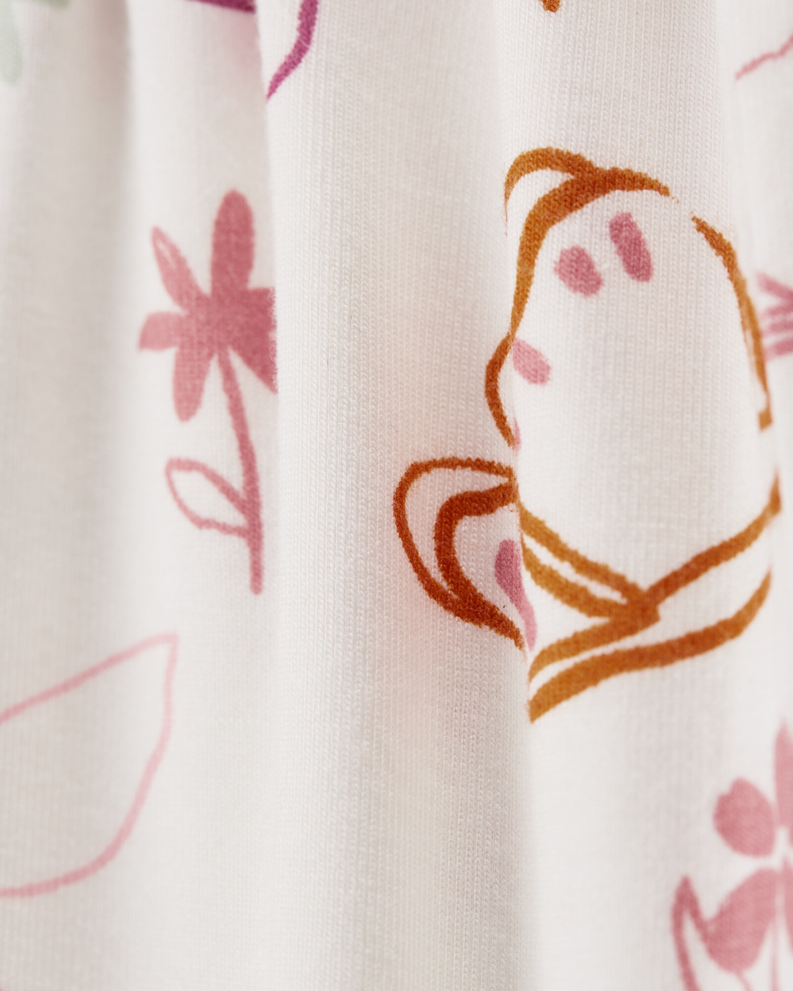 Pijama uno pieza de viscosa Ecovero, con pie, diseño floral, línea Purelysoft Pijama uno pieza de viscosa Ecovero, con pie, diseño floral, línea Purelysoft