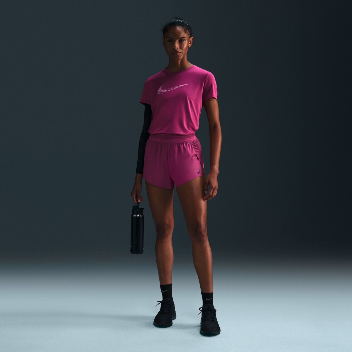 Remera Nike One de Mujer - Rosado 