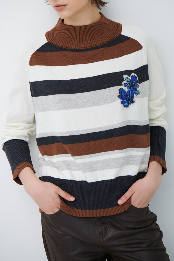 POLERA RAYA FLOR NATURAL