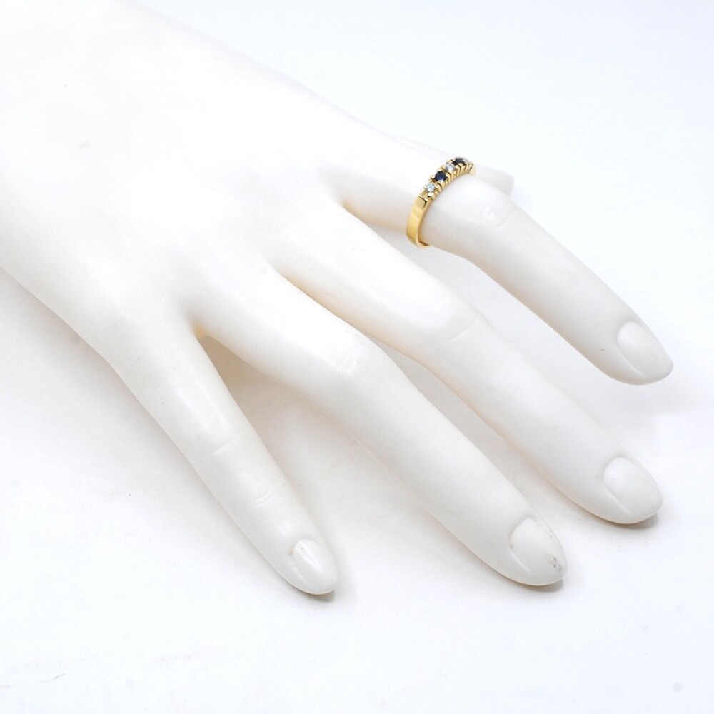 Anillo medio sin fin en oro 18K con brillantes y zafiros Anillo medio sin fin en oro 18K con brillantes y zafiros
