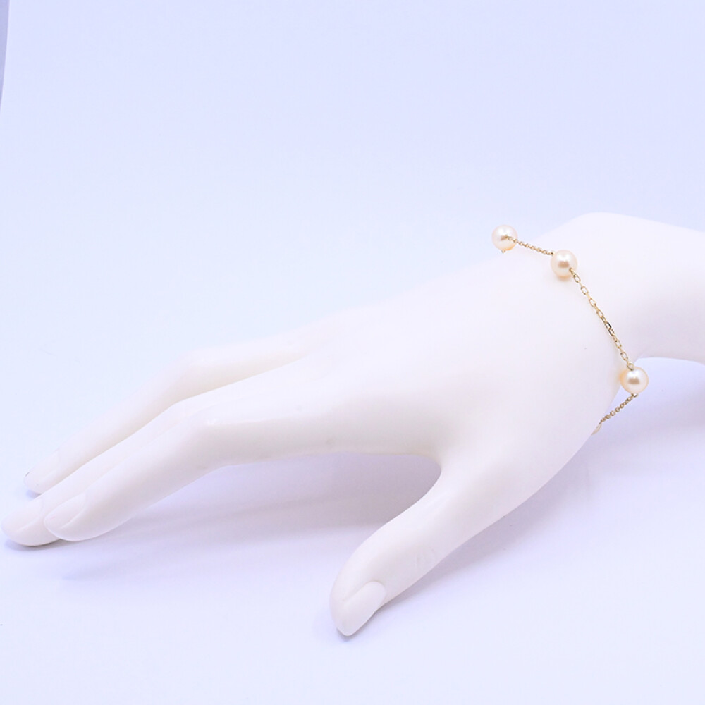 Pulsera oro 18 k y 5 perlas de cultivo. Pulsera oro 18 k y 5 perlas de cultivo.