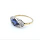 Anillo en oro 18k con piedra de color azul y diamantes Anillo en oro 18k con piedra de color azul y diamantes