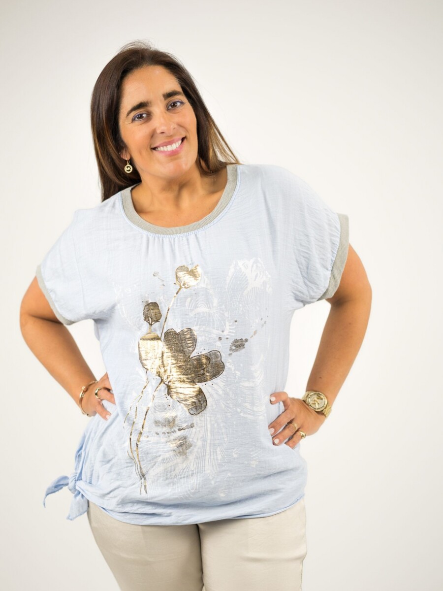 Blusa con nudo estampada con dorado Celeste
