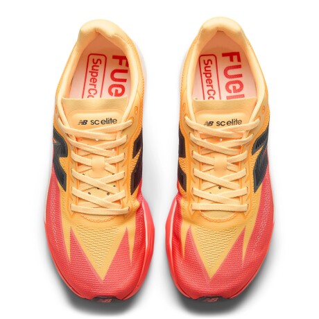 Championes New Balance de Dama - Rebel V4 - WRCEL4JM ORANGE