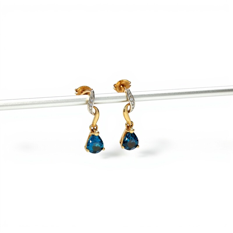 Caravanas oro Gotas Topacio Azul- Oro bajo - Topacio azul y Zirconias- CA8003 conpiedra
