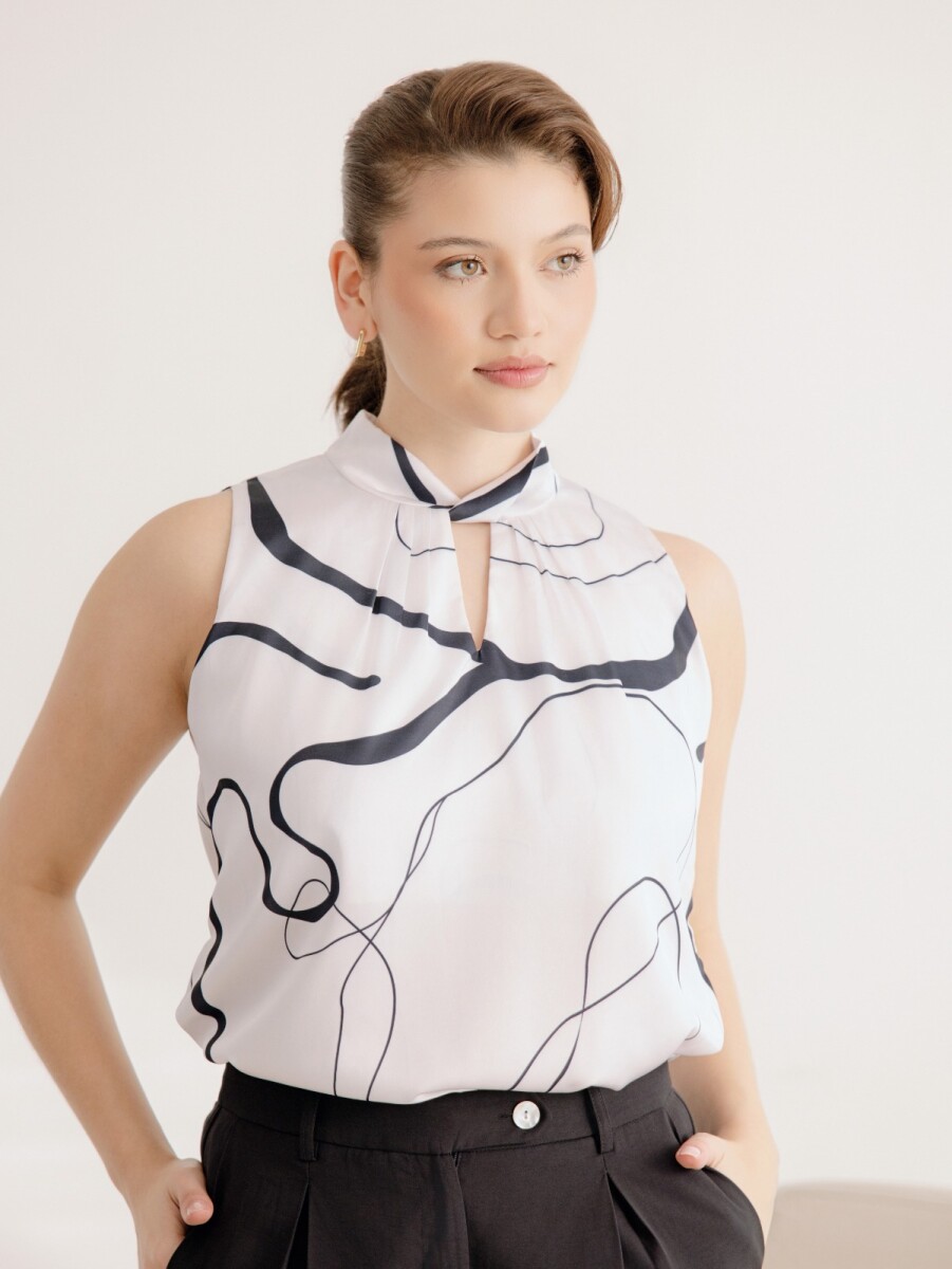 Blusa Halter. - Estampa natural y negro. 