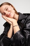 PULSERA DE HILO NEGRO CON PERLA SHELL FORNITURA BAÑADA EN PLATA DE LEY. Pulsera