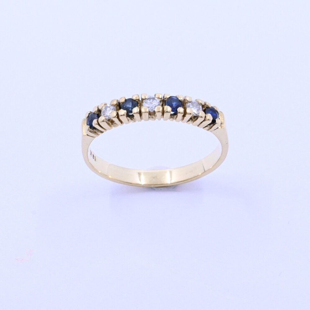 Anillo medio sin fin oro 18k amarillo con zafiros y brillantes. Anillo medio sin fin oro 18k amarillo con zafiros y brillantes.