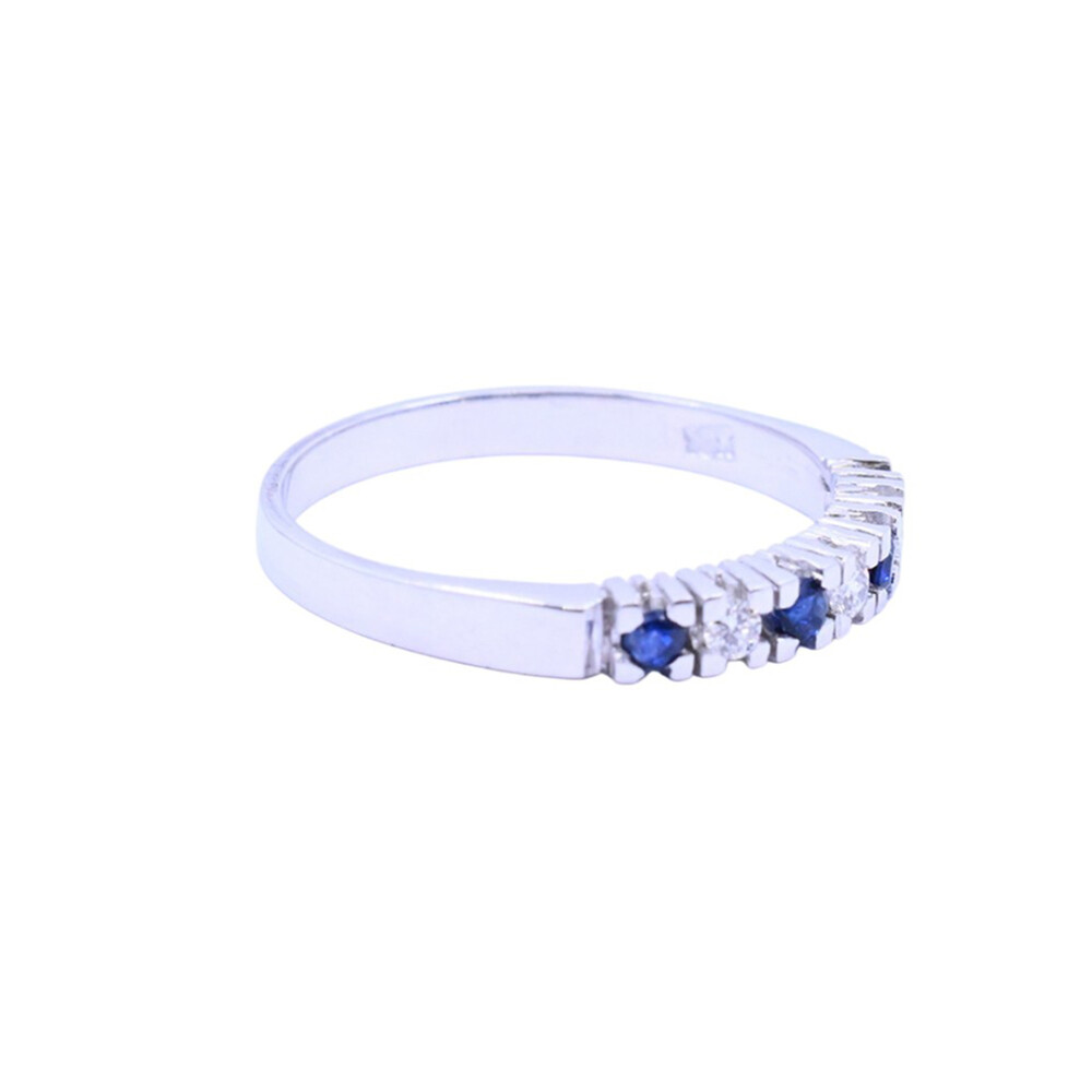 Anillo oro 18 k blanco con zafiros azules y brillantes. Anillo oro 18 k blanco con zafiros azules y brillantes.