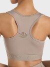 TOP PRO TRAINING SPORTS BRA Umbro Mujer 00b