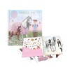 Libro con stickers Top Model - Dress me up Miss Melody
