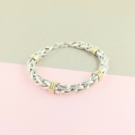 Pulsera de plata 925 con detalles en double de oro 18 ktes. Pulsera de plata 925 con detalles en double de oro 18 ktes.