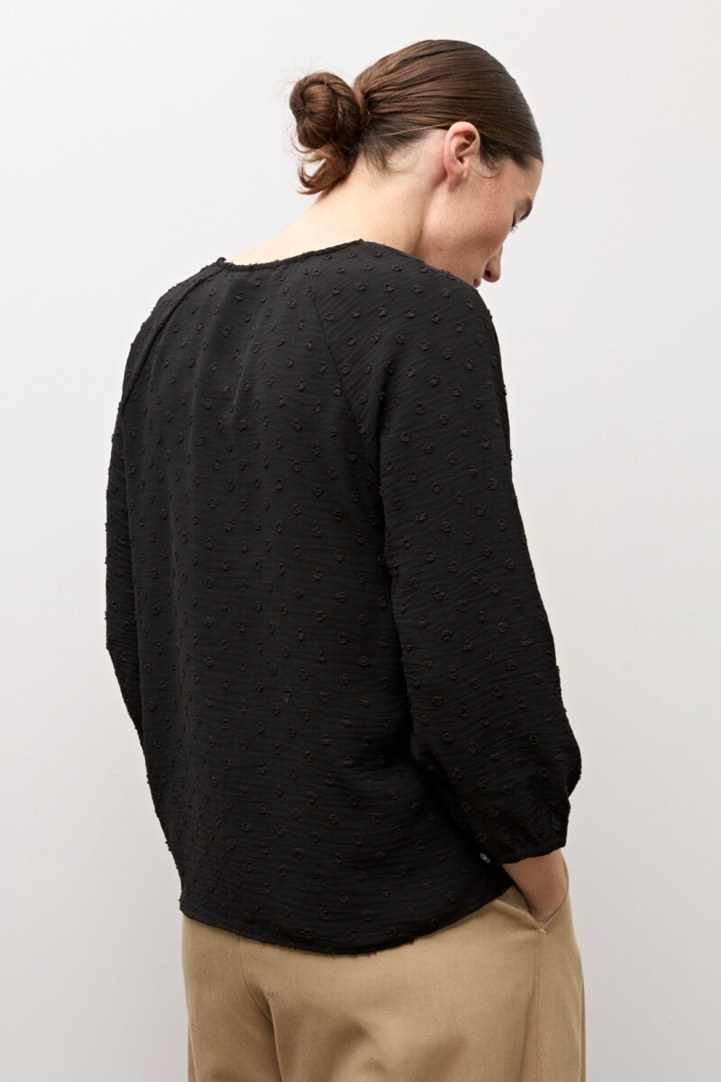 Blusa plumeti escote V negro
